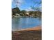 Peaceful lake view with waterfront homes and fall foliage at 3233 Greenhill Dr, Villa Rica, GA 30180