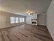 Large living room with hardwood floors and a fireplace at 3233 Greenhill Dr, Villa Rica, GA 30180