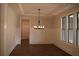 Formal dining room with hardwood floors and wainscoting at 5275 Flannery Chase Sw, Powder Springs, GA 30127