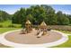 Community playground with play structures and a walking path at 5275 Flannery Chase Sw, Powder Springs, GA 30127