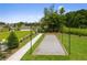 Outdoor bocce ball court with a walking path nearby at 739 Marlay Sw Ln, Powder Springs, GA 30127