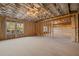 Unfinished basement with exposed framing and two windows at 739 Marlay Sw Ln, Powder Springs, GA 30127