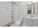 Modern bathroom with white tile shower and grey vanity at 223 Kathryn Ln, Marietta, GA 30066