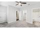 Bedroom with carpet flooring, ceiling fan, and ensuite bathroom at 721 Bismark Ne Rd, Atlanta, GA 30324