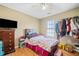 Bedroom with hardwood floors, ceiling fan, and plenty of closet space at 101 Shannon Chase Ln, Fairburn, GA 30213