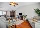 Relaxing living room with hardwood floors and a fireplace at 101 Shannon Chase Ln, Fairburn, GA 30213