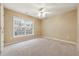 Bright bedroom with ceiling fan and carpet at 2368 Harshaw Ave # 166, Lawrenceville, GA 30043