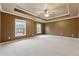 Large bedroom with carpeted floor and ceiling fan at 2368 Harshaw Ave # 166, Lawrenceville, GA 30043
