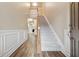 Two-story entryway with hardwood floors and a carpeted staircase at 2368 Harshaw Ave # 166, Lawrenceville, GA 30043