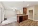 Open kitchen features granite counters and breakfast bar at 2368 Harshaw Ave # 166, Lawrenceville, GA 30043