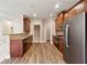 Modern kitchen with granite countertops and stainless steel appliances at 2368 Harshaw Ave # 166, Lawrenceville, GA 30043