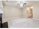 Open concept living room with neutral walls and carpet at 2368 Harshaw Ave # 166, Lawrenceville, GA 30043