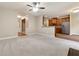 Open living room with a view of the kitchen and entryway at 2368 Harshaw Ave # 166, Lawrenceville, GA 30043