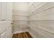Walk-in pantry with ample shelving for storage at 2368 Harshaw Ave # 166, Lawrenceville, GA 30043