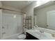 Clean bathroom featuring a shower/tub combo and vanity at 3393 Sardis Bend Dr, Buford, GA 30519