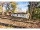 White brick house with a large backyard at 2281 Nelms Sw Dr, Atlanta, GA 30315