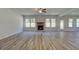 Spacious Gathering room featuring a fireplace and hardwood floors at 62 Homesite Cooper W Cv, Fayetteville, GA 30215