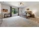 Main bedroom with large windows, ceiling fan, and ample floor space at 530 Penny Ln, Loganville, GA 30052