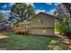 Two-story home with grey siding and wooden deck at 520 Mountainview Dr, Covington, GA 30016