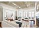 Bright living room with hardwood floors, high ceilings, and french doors at 3370 Habersham Nw Rd, Atlanta, GA 30305