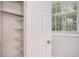 Shelved closet offers ample storage space at 4218 Tara Dr, Forest Park, GA 30297