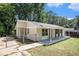Newly renovated ranch home with covered porch and fenced yard at 4218 Tara Dr, Forest Park, GA 30297