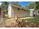 View of the back of the house and backyard at 4218 Tara Dr, Forest Park, GA 30297
