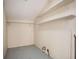 Laundry area with overhead shelving for storage at 4218 Tara Dr, Forest Park, GA 30297