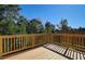 Wooden deck overlooks wooded area at 7016 Fringe Flower Dr # 88, Austell, GA 30168