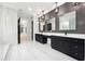 Elegant bathroom with double vanities and a view at 3165 Hall Rd, Dacula, GA 30019