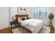 Cozy bedroom with hardwood floors and neutral decor at 2240 Cheshire Bridge Rd # 205, Atlanta, GA 30324