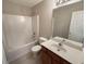 Clean bathroom featuring a tub shower, toilet and vanity at 2491 Emma Way, Lawrenceville, GA 30044