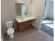 Bathroom with vanity, toilet and bathtub at 2491 Emma Way, Lawrenceville, GA 30044