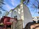Townhouse with wooden deck and fenced backyard at 2491 Emma Way, Lawrenceville, GA 30044