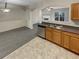 Kitchen with stainless steel appliances and wood cabinets at 2491 Emma Way, Lawrenceville, GA 30044