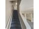 Carpeted staircase leading to upper level at 2491 Emma Way, Lawrenceville, GA 30044