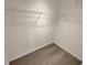 Large walk-in closet with wire shelving at 2491 Emma Way, Lawrenceville, GA 30044