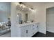 Double vanity bathroom with walk-in closet at 401 Carrera Ln, Acworth, GA 30102