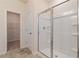 Bathroom with a walk-in shower and access to a closet at 7000 Fringe Flower Dr # 85, Austell, GA 30168