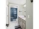 Modern bathroom with walk-in shower and double vanity at 117 N Cove Dr, Peachtree City, GA 30269