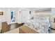 Spacious bedroom with ensuite bathroom and hardwood floors at 117 N Cove Dr, Peachtree City, GA 30269