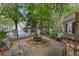Private courtyard with fountain, seating, and brick pavement at 117 N Cove Dr, Peachtree City, GA 30269