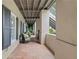 Covered patio with tiled flooring and comfortable seating at 117 N Cove Dr, Peachtree City, GA 30269