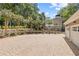 Spacious brick driveway with attached garage and landscaping at 117 N Cove Dr, Peachtree City, GA 30269