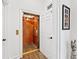 Convenient home elevator with wood paneling and hardwood floors at 117 N Cove Dr, Peachtree City, GA 30269