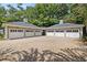 Large 6-car garage with brick paver driveway at 117 N Cove Dr, Peachtree City, GA 30269