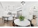 Modern kitchen with white cabinets and a large island at 117 N Cove Dr, Peachtree City, GA 30269