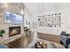 Living room features a stone fireplace and large TV at 117 N Cove Dr, Peachtree City, GA 30269