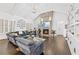 Spacious living room with fireplace and built-in shelving at 117 N Cove Dr, Peachtree City, GA 30269