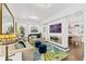 Bright living room with fireplace and dining area at 117 N Cove Dr, Peachtree City, GA 30269